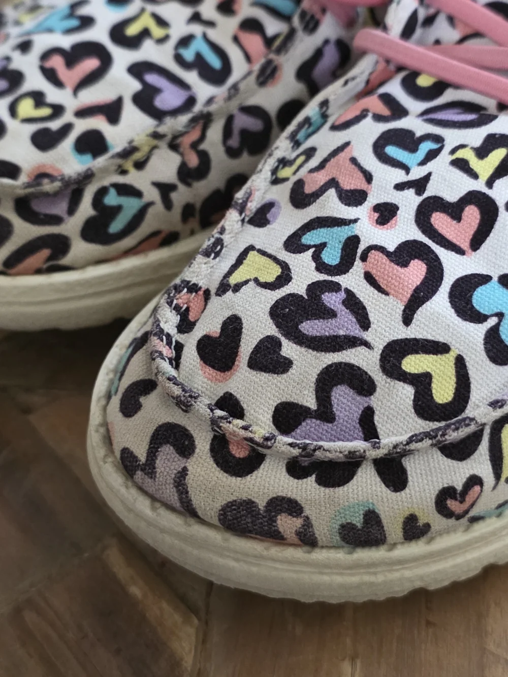 Hey Dude Kids Heart-Print Slip-On Shoes in White with Pastel Accents, 3